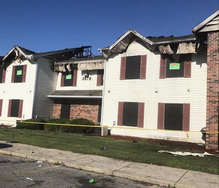 Board up services after fire damage at apartment complex